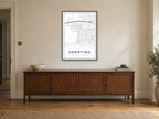 Sompting Village Centre Street Map Poster at A1, in a black frame, above a sideboard