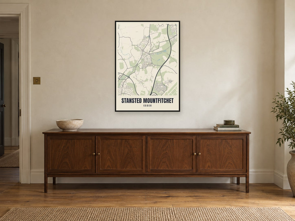 Stansted Mountfitchet Street Map Poster at A1, in a black frame, above a sideboard