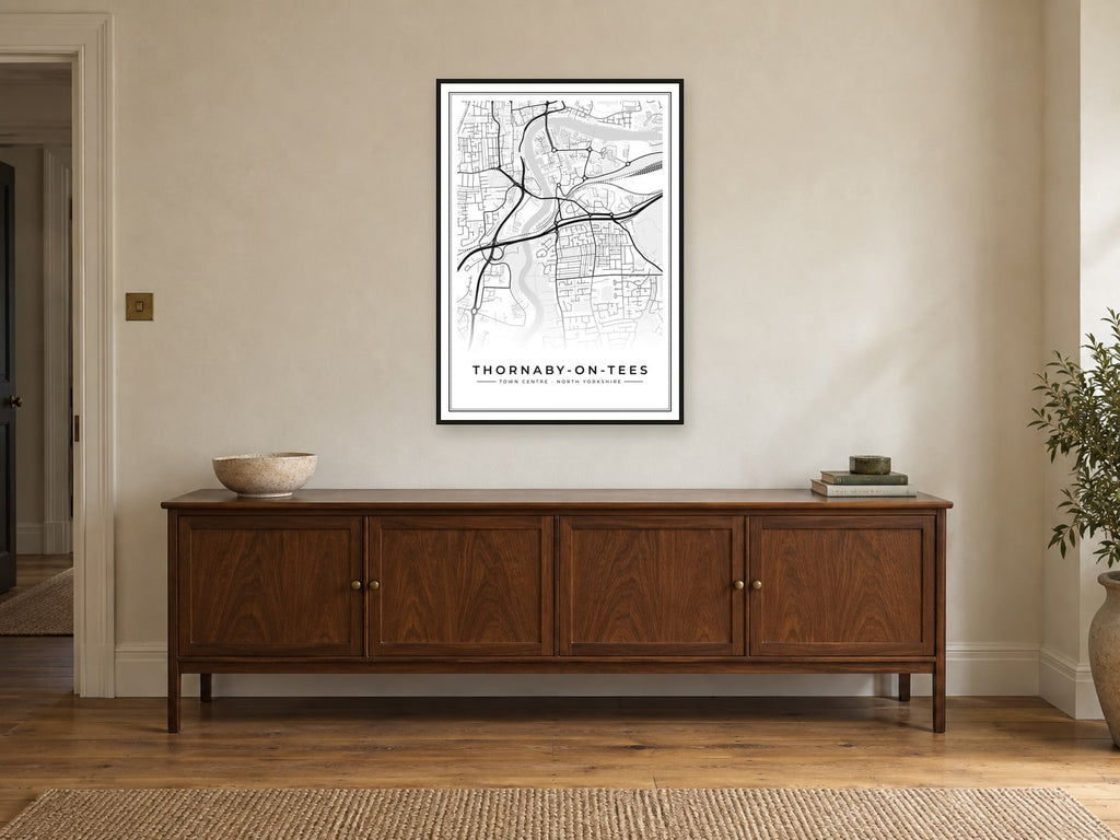 Thornaby-on-Tees Town Centre Street Map Poster at A1, in a black frame, above a sideboard